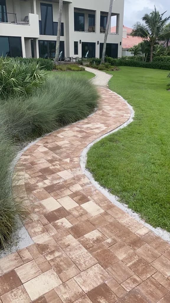Travertine paver walkway to a coastal estate — Longboat Key FL