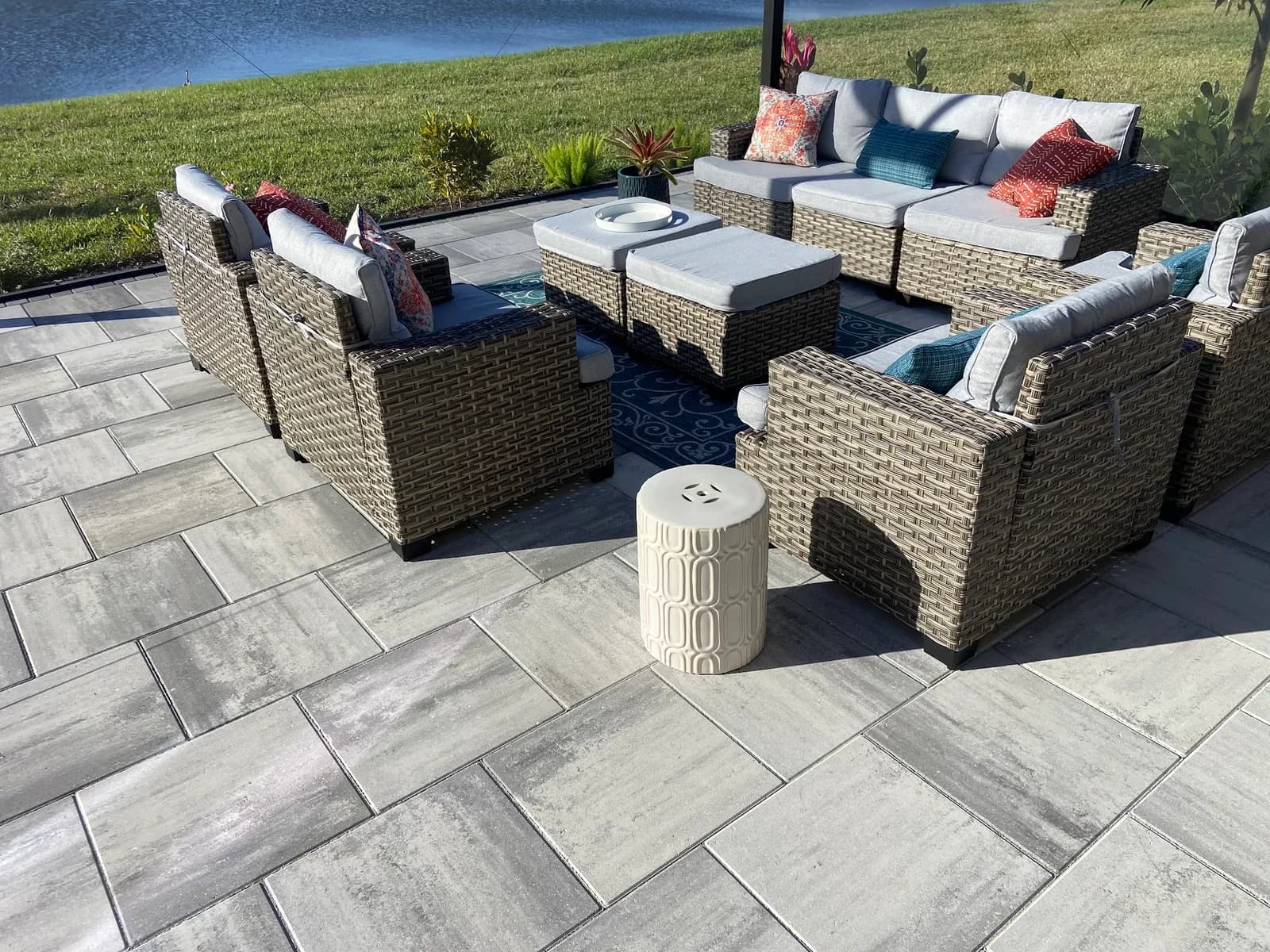 Lakefront paver patio outdoor living space in Lakewood Ranch, FL