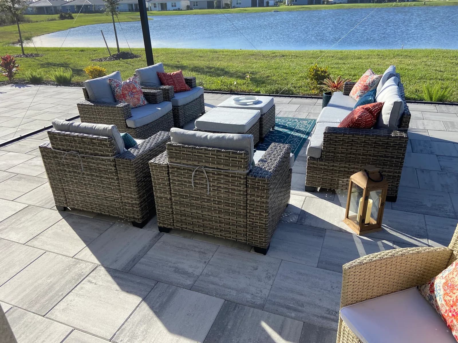 Paver patio outdoor living space with lake view in Bradenton FL
